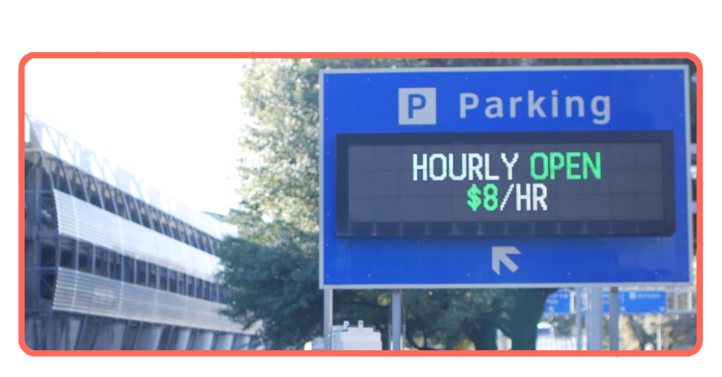 Traveler checking airport parking reservation on smartphone before departure